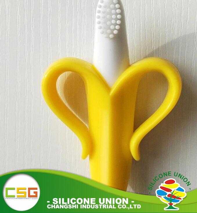 Hot sale silicone rattle teether,baby toothbrush teether / silicone banana shape baby teether