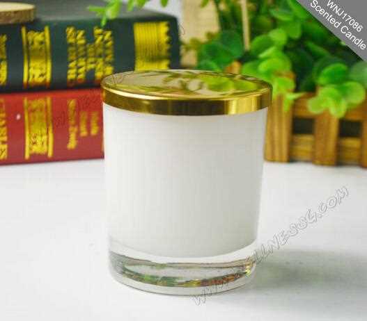 Scented soy candle in glass jar with aluminum lid