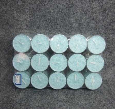 Multi-colored scented tealight candle