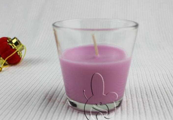 Multi-Colored scented candle in glass holder 