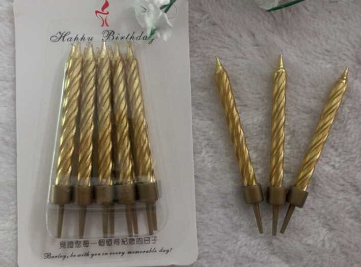 Gold and silver color spiral taper candle