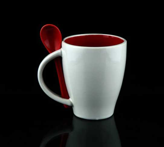 colorful inner and white external mug with spoon