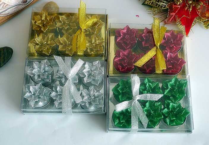 Flower shaped christmas tealight candle with 4 colors
