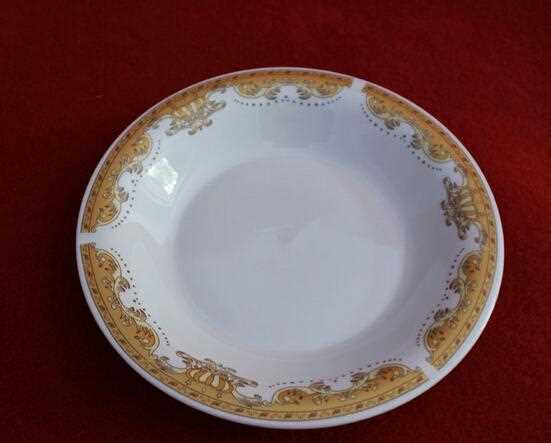 White Ceramic Plate With Gold Round Edge
