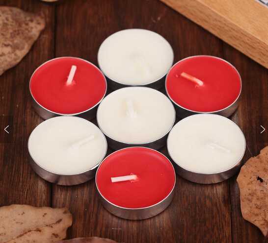 Custom fragrance colored tealight candle