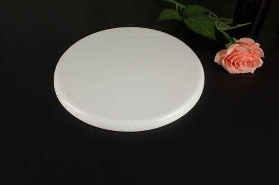 Beige ivory ceramic plate with bumping uneven surface