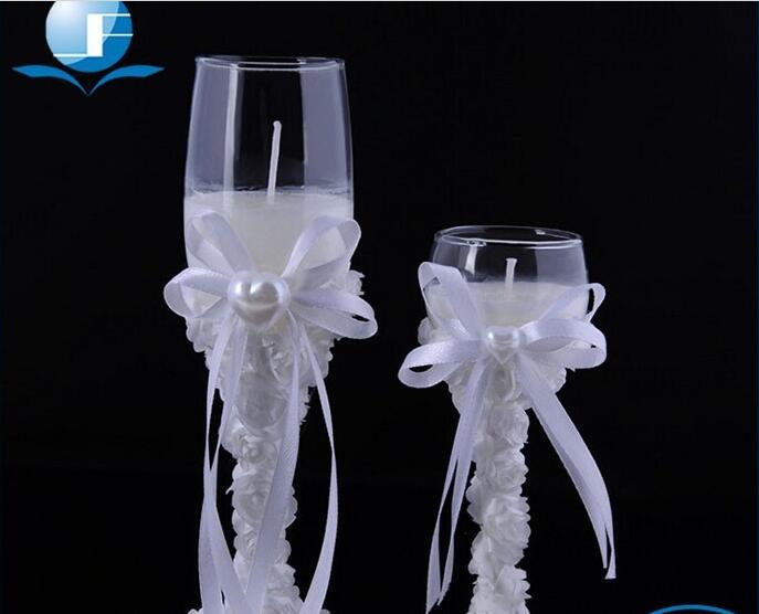 glass cup candle white flower around for wedding