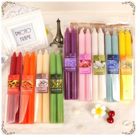 Multi-colored paraffin wax tall taper candle
