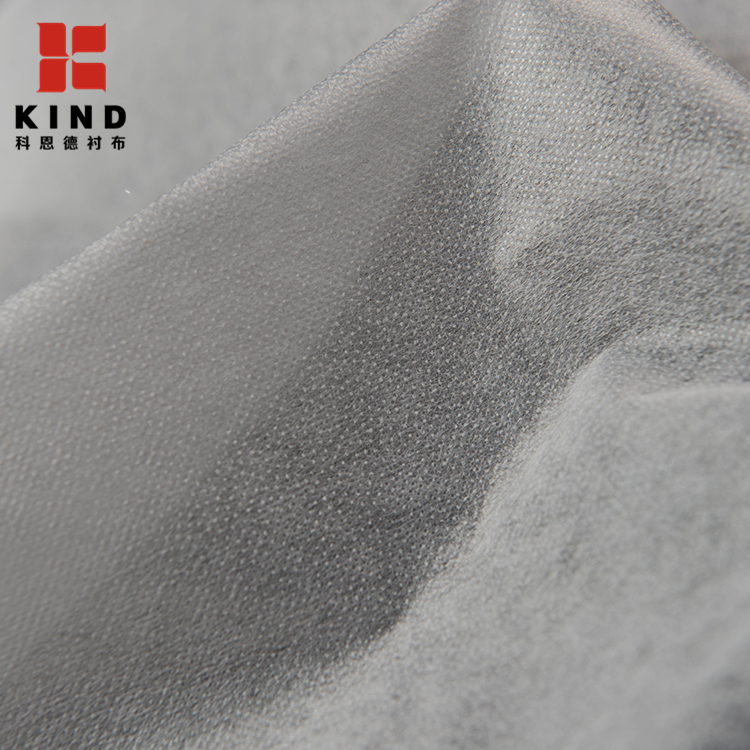 Garment Fabric Non Woven Polyester Fusible Fabric Interlining For Party Dress sale